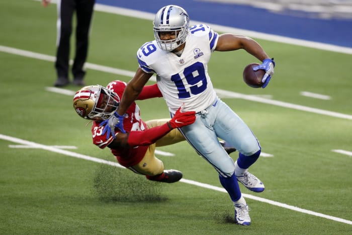 Dallas Cowboys WR Amari Cooper breaks tackle